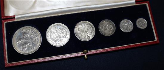 A George V silver coin set 1935, the threepence a 1914 replacement.